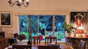 House, 5 Bedrooms, Balcony, Garden View | Dining room - Serene Whangarei Lifestyle Luxurious Modern Home With Trees and Garden Views (Glenbervie)