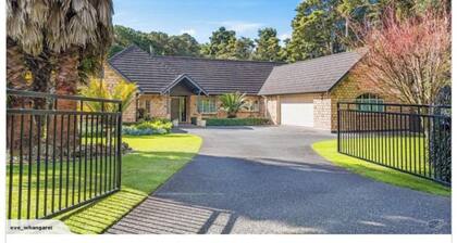 Serene Whangarei Lifestyle Luxurious Modern Home With Trees and Garden Views