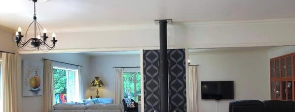 Living room - Serene Whangarei Lifestyle Luxurious Modern Home With Trees and Garden Views (Glenbervie)