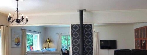 Serene Whangarei Lifestyle Luxurious Modern Home With Trees and Garden Views