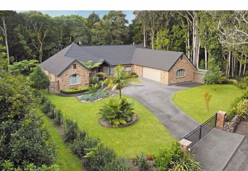Serene Whangarei Lifestyle Luxurious Modern Home With Trees and Garden Views