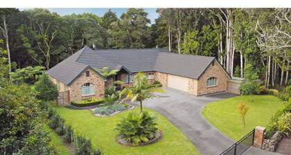 Serene Whangarei Lifestyle Luxurious Modern Home With Trees and Garden Views
