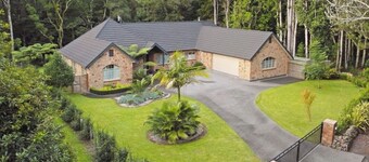 Serene Whangarei Lifestyle Luxurious Modern Home With Trees and Garden Views
