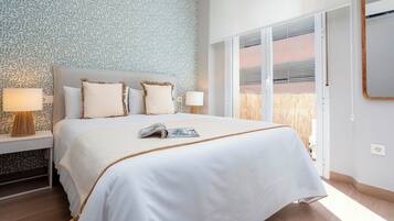 Apartment (2 Bedrooms) | Iron/ironing board, bed sheets