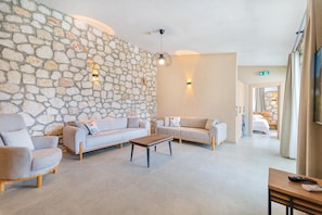 Deluxe Villa, Private Pool | Living area | 51-inch LCD TV with cable channels