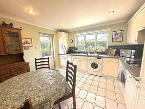 Fridge, oven, dining tables