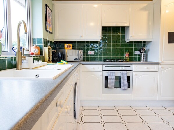 Fridge, oven, dining tables