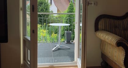 Vacation apartment on the Main, (65 m²) with balcony and garden