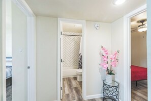 Combined shower/tub, hair dryer, towels, soap