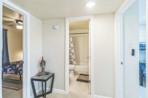 Combined shower/tub, hair dryer, towels, soap