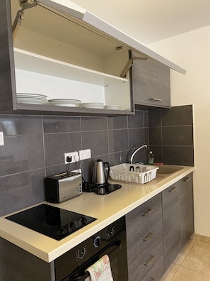 Deluxe Studio | Private kitchen | Full-sized fridge, oven, stovetop, toaster