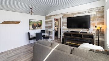 House, Multiple Beds, Hot Tub, Garden View (Bison View) | Living area | 55-inch flat-screen TV with digital channels