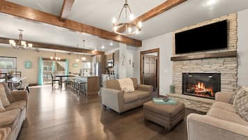 Smart TV, chimenea, videojuegos y futbolito