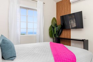 2 habitaciones, tabla de planchar con plancha y cuna de viaje 