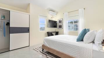 2 habitaciones, tabla de planchar con plancha y cuna de viaje