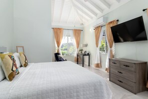 1 bedroom, desk, iron/ironing board, travel crib