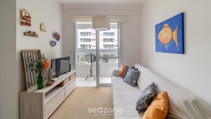 Basic Apartment | Living area - Moderno Apto c/ Piscina em Canasvieiras RCP202 (Florianópolis)