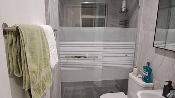 Shower, towels, soap, shampoo