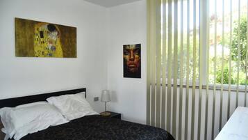 1 chambre, fer et planche Ă repasser, Wi-Fi gratuit, draps fournis