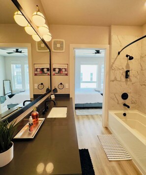 Shower, hair dryer, towels