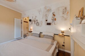 1 habitación, tabla de planchar con plancha, wifi y ropa de cama 