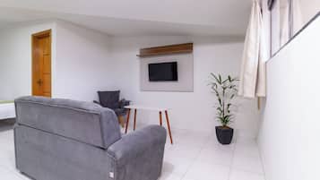 Habitación cuádruple Deluxe, vistas a la ciudad | Wifi gratis