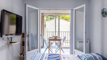 Fer et planche Ă repasser, draps fournis