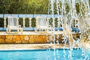 Indoor pool, 2 outdoor pools, open 10:00 AM to 8:00 PM, pool umbrellas