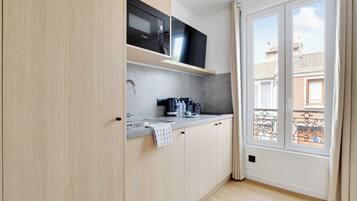 Apartment | Private kitchen | Fridge, microwave, stovetop, electric kettle