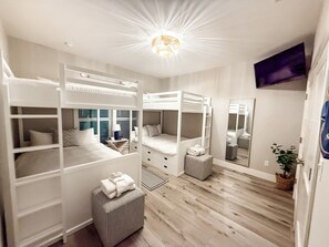 5 bedrooms, desk, iron/ironing board, travel crib - Luxury beach escape, 2 blocks to the ocean & 1 block to the river! Sauna, heated pool, hot tub, paddle boards, kayaks, golf cart & more—only 10 mins to downtown St. Augustine. Very clean, well stocked & perfect for couples, families & small groups. (St. Augustine)