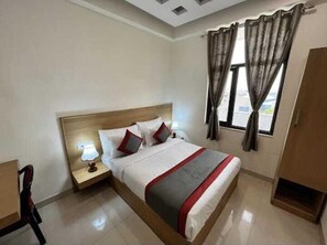 Egyptian cotton sheets, premium bedding, desk, laptop workspace