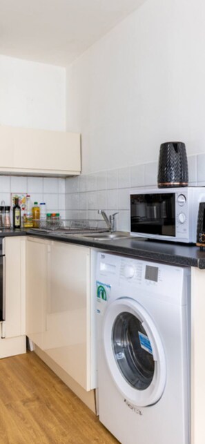Microwave, oven, stovetop, cookware/dishes/utensils