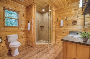 Shower, hair dryer, towels, shampoo