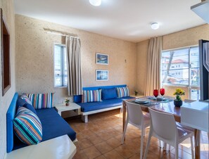 Basic Apartment | Living area | TV - Apt 6 min From the sea in Canasvieiras-sc Rba201 (Florianópolis)