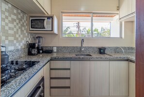 Basic Apartment | Private kitchen | Cookware/dishes/utensils - Apt 6 min From the sea in Canasvieiras-sc Rba201 (Florianópolis)