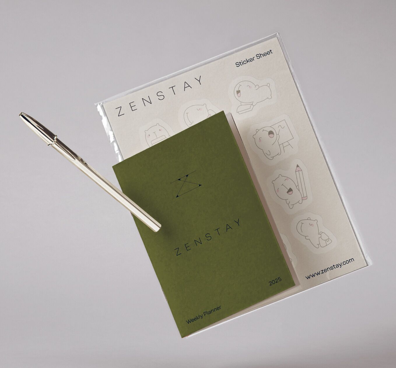 A planner with a pen, labeled 'ZENSTAY' and 'Weekly Planner' for 2025.