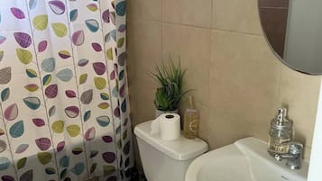 Hair dryer, towels, soap, toilet paper