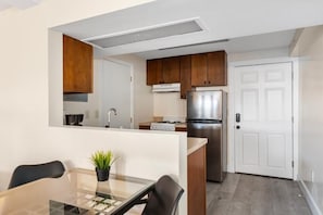 Fridge, microwave, stovetop, coffee/tea maker
