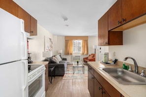 Fridge, microwave, stovetop, coffee/tea maker
