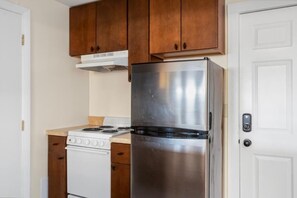 Fridge, microwave, stovetop, coffee/tea maker