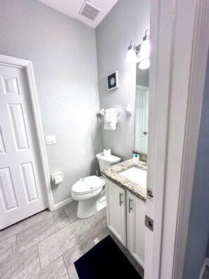 Hair dryer, towels, soap, toilet paper