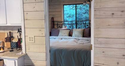 Rustic 2BR solar cabin near Taos — unplug, unwind, and enjoy the views.