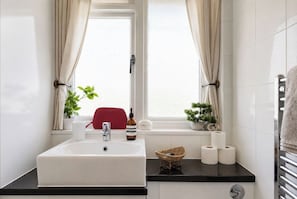 Hair dryer, towels, soap, shampoo