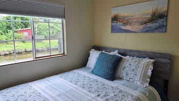 1 bedroom, desk, iron/ironing board, travel crib