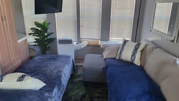 1 bedroom, desk, iron/ironing board, travel cot