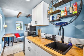 Fridge, microwave, coffee/tea maker, toaster