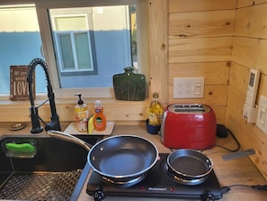 Fridge, microwave, stovetop, coffee/tea maker