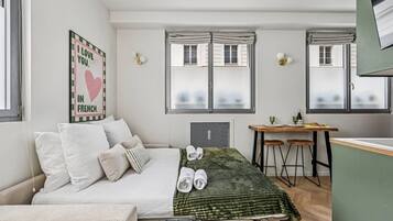 1 slaapkamer, een strijkplank/strijkijzer, reisbedje, gratis wifi