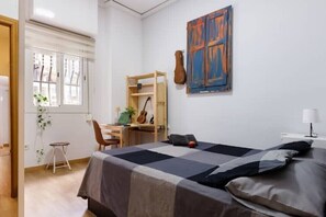 1 bedroom, desk, iron/ironing board, travel crib