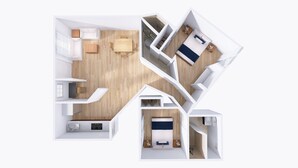 Een modern appartement met een woonkamer, keuken, eethoek en twee slaapkamers.